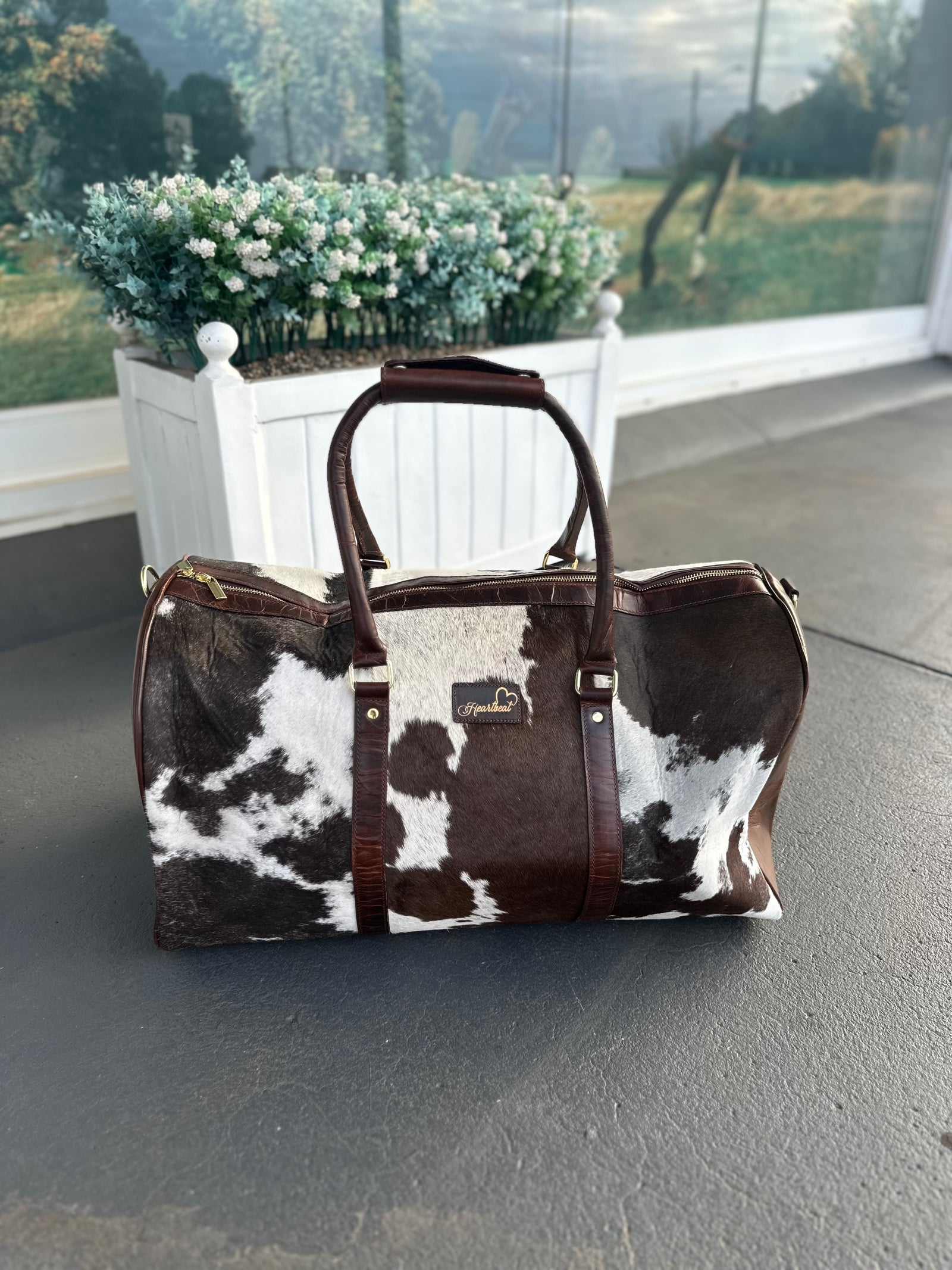 Heartbeat Trail Cowhide Duffle Bag