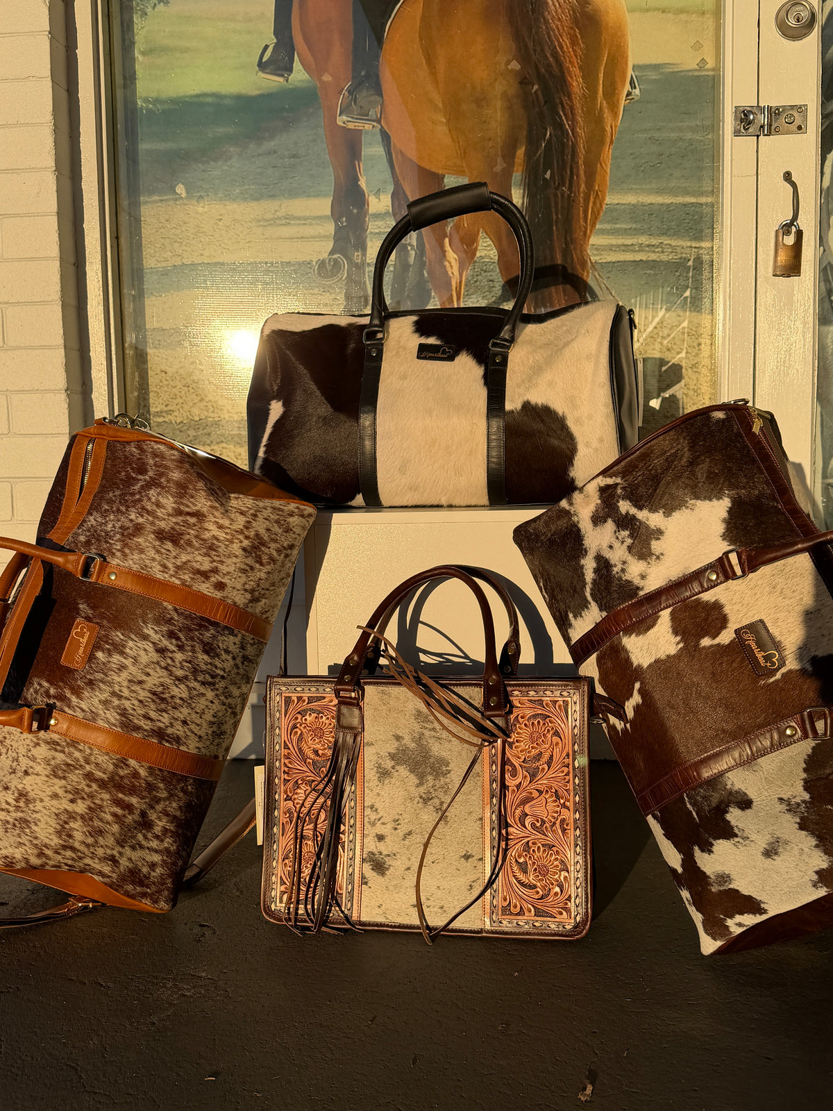 Heartbeat Trail Cowhide Duffle Bag