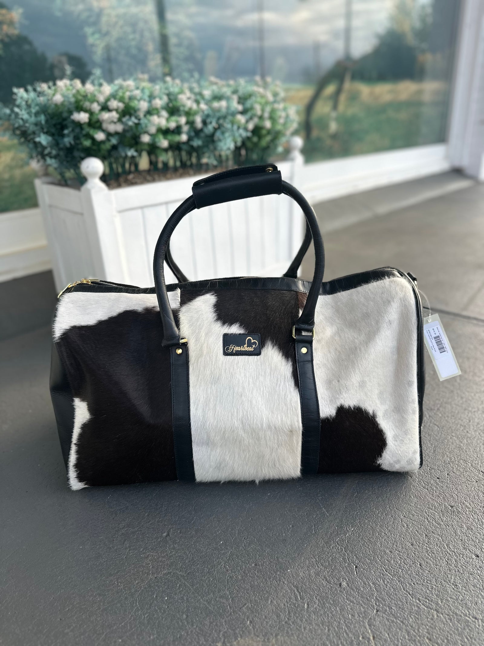 Heartbeat Trail Cowhide Duffle Bag