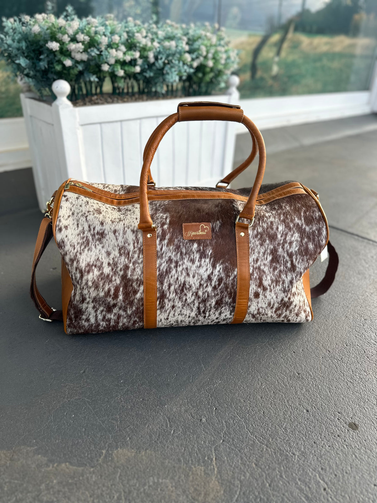 Heartbeat Trail Cowhide Duffle Bag